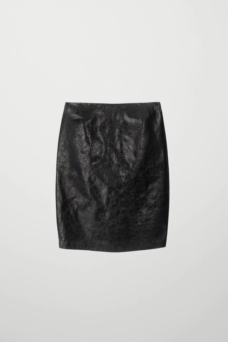 Shiny leather skirt by VICTORIA SLAVINSKAIA in black crinkled patent leather, front view